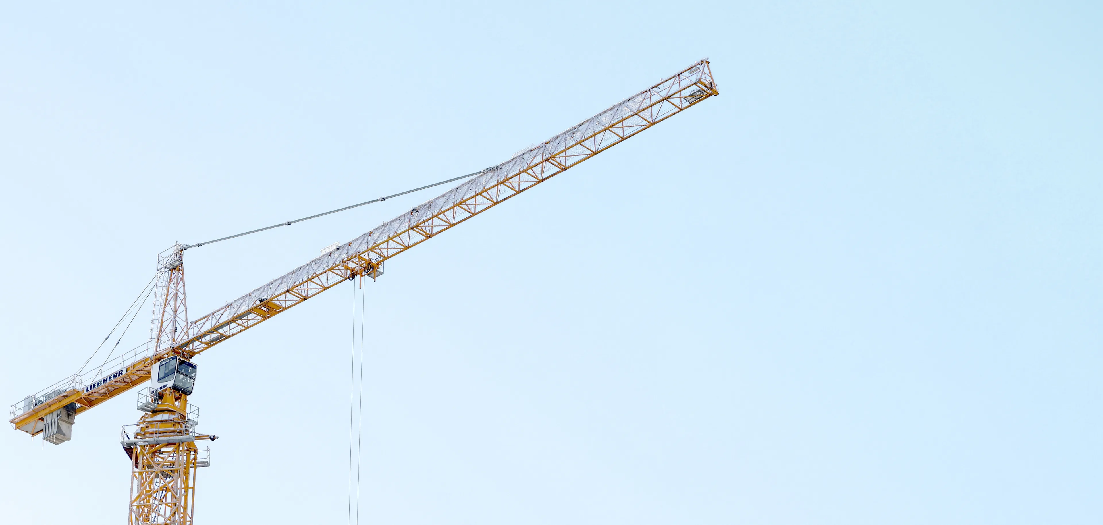 Industry sectors We Serve Construction site background with crane